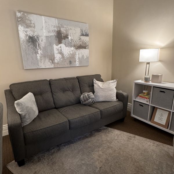 Gray-Couch-Cube-Shelves-in-Draper-Office-Rooted-Counseling-Wellness