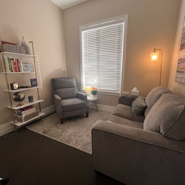 Gray-Lounge-Chair-Sofa-in-Draper-Office-Rooted-Counseling-Wellness